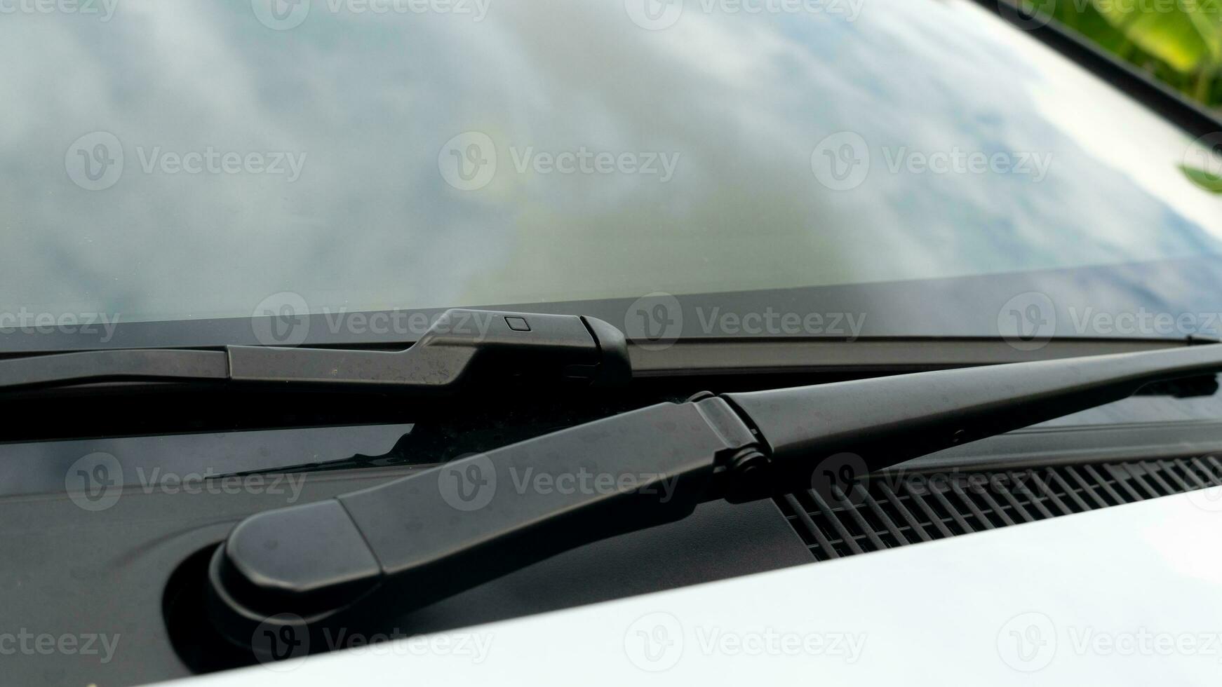 Black wiper blade stalk on the car. photo