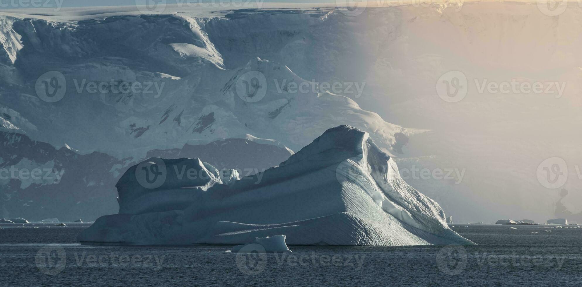 Tempano floating in the Antarctic Sea, near the Antarctic Peninsula. photo