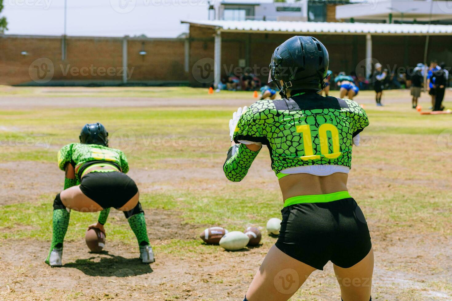 Mexican woman American football player training in a llanero field photo