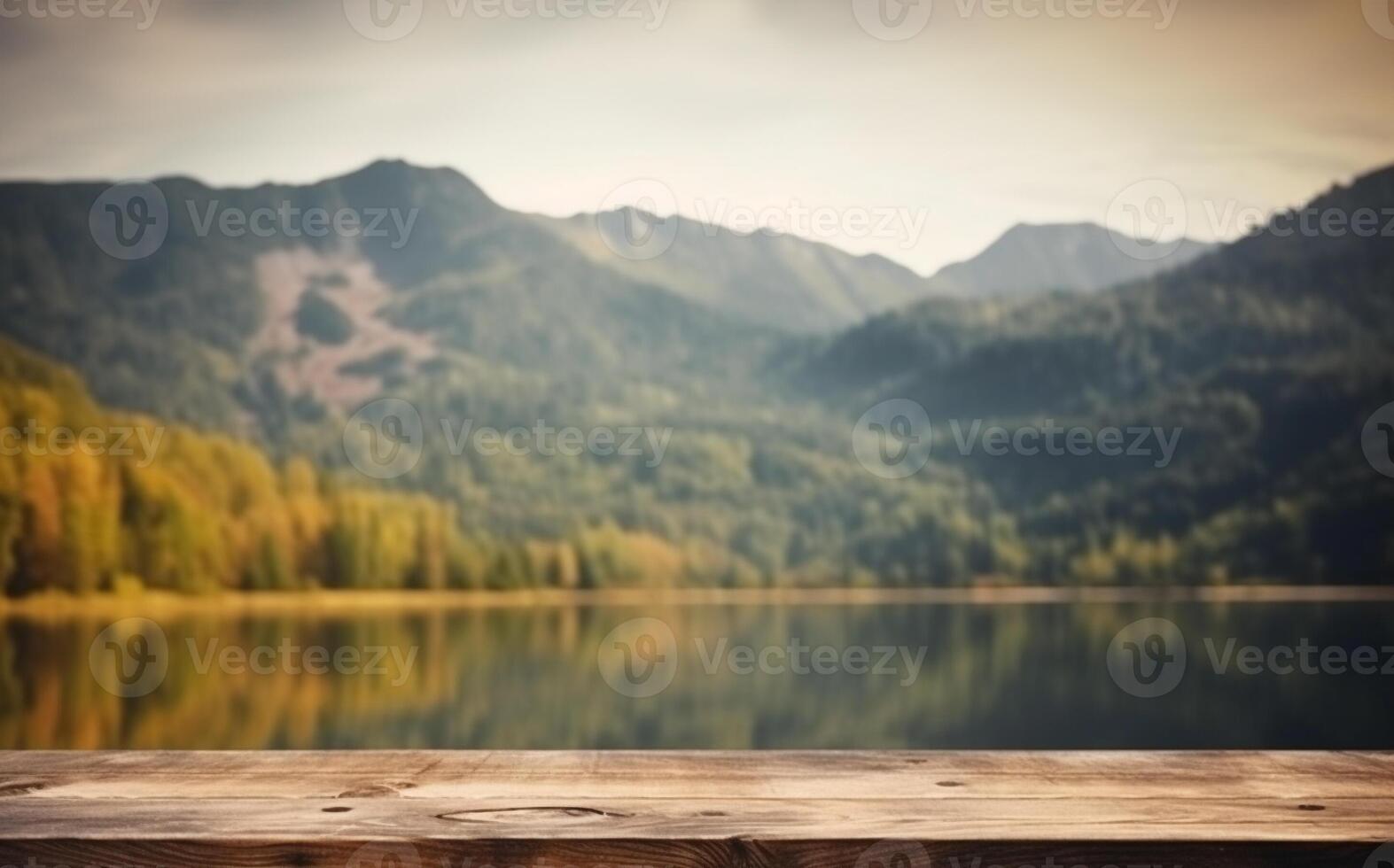 Empty wooden table decorated with meadow blurred lake and mountain view background. . photo