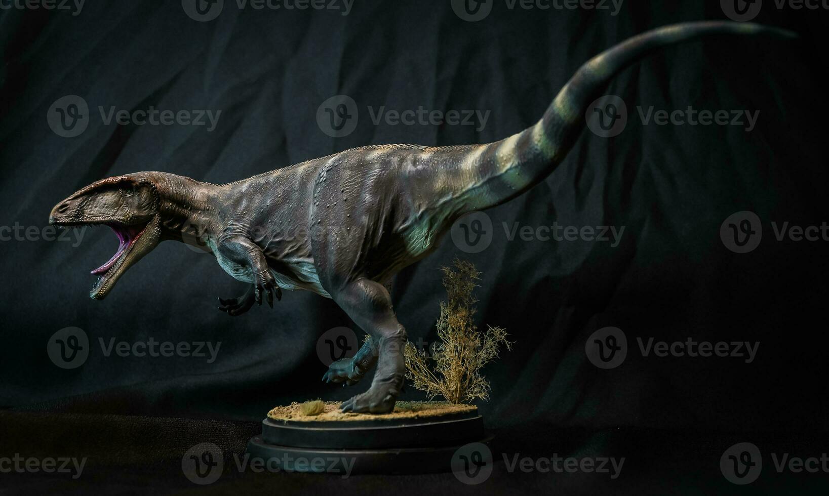 Carcharadontosaurus Dinosaur in the dark photo