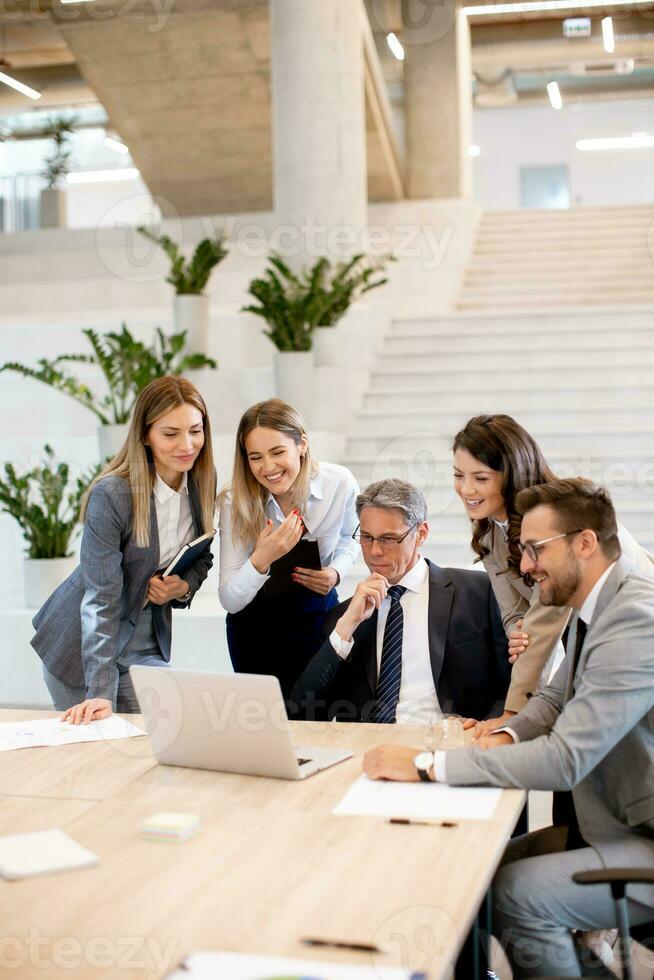 Young startup team working in the office photo