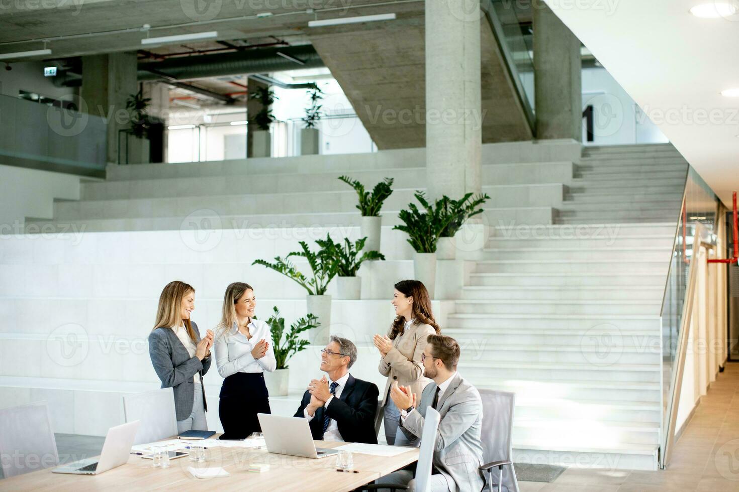 Young startup team working in the office photo