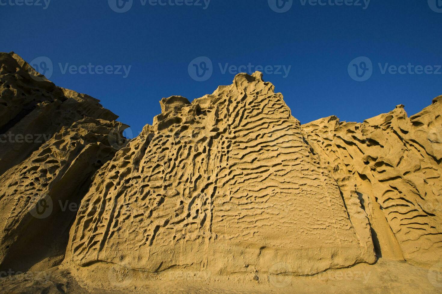 Vlychada beach volcanic ash sand rock formation on Santorini island in Greece photo