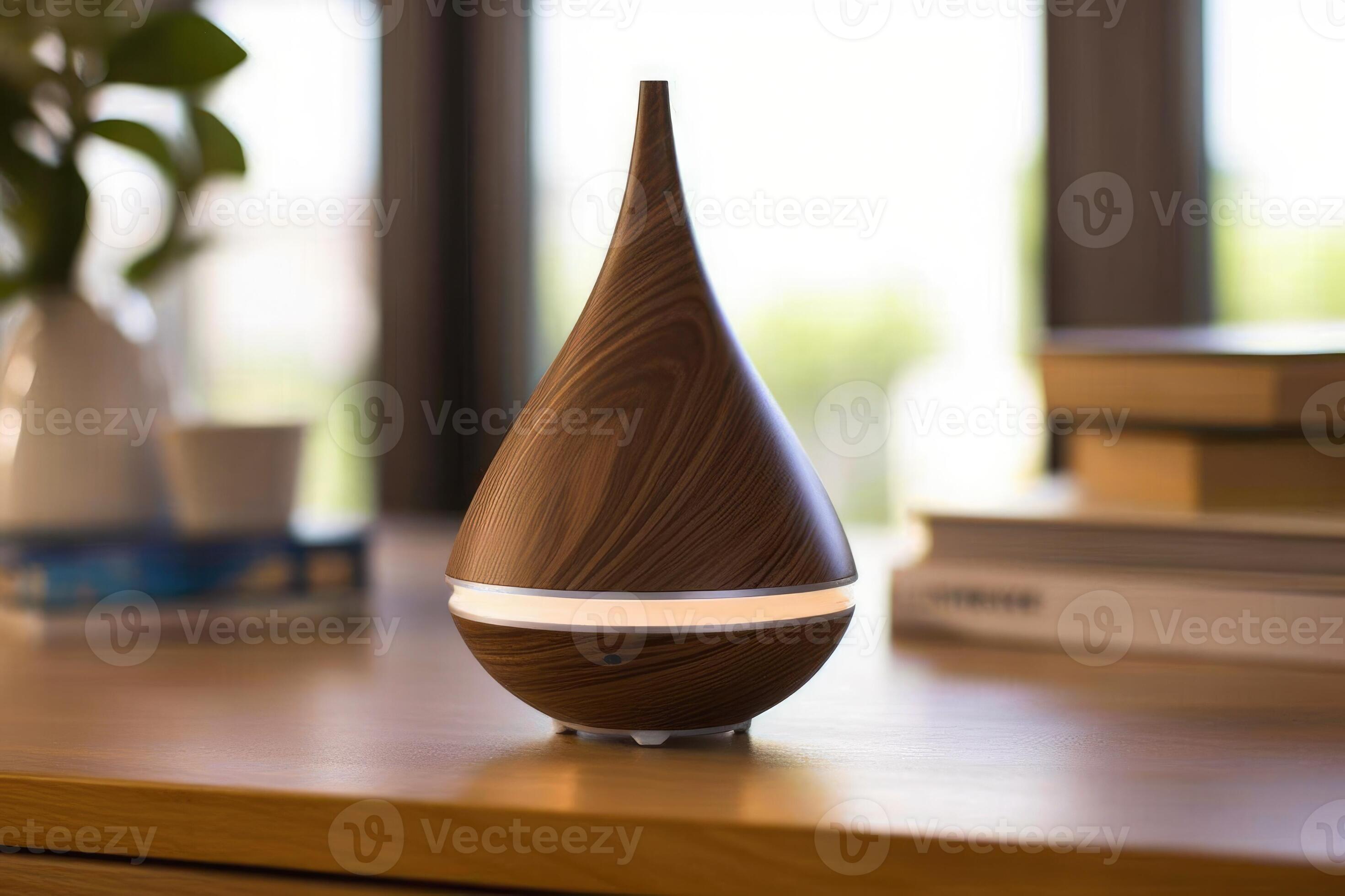 Aroma oil diffuser lamp on a blurred background. 26439875 Stock Photo