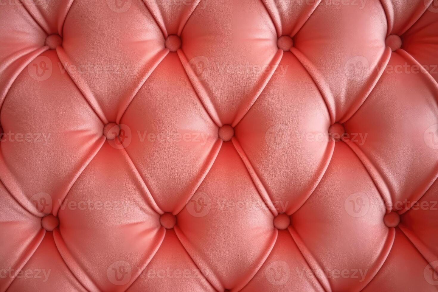 Textured background sofa in coral colours. photo