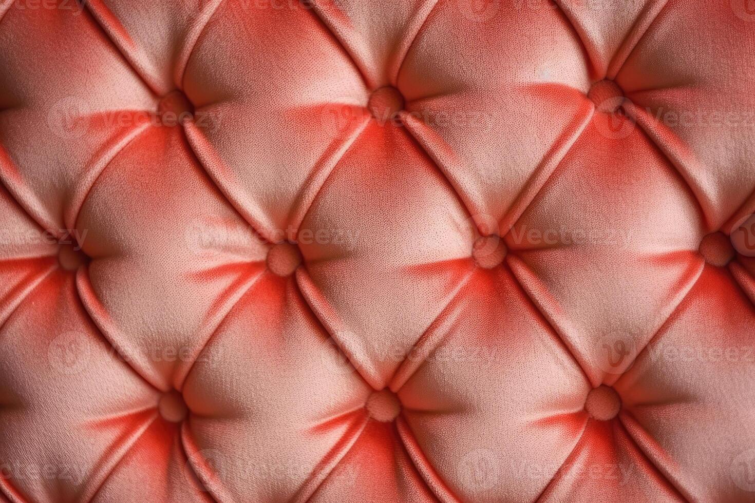 Textured background sofa in coral colours. photo