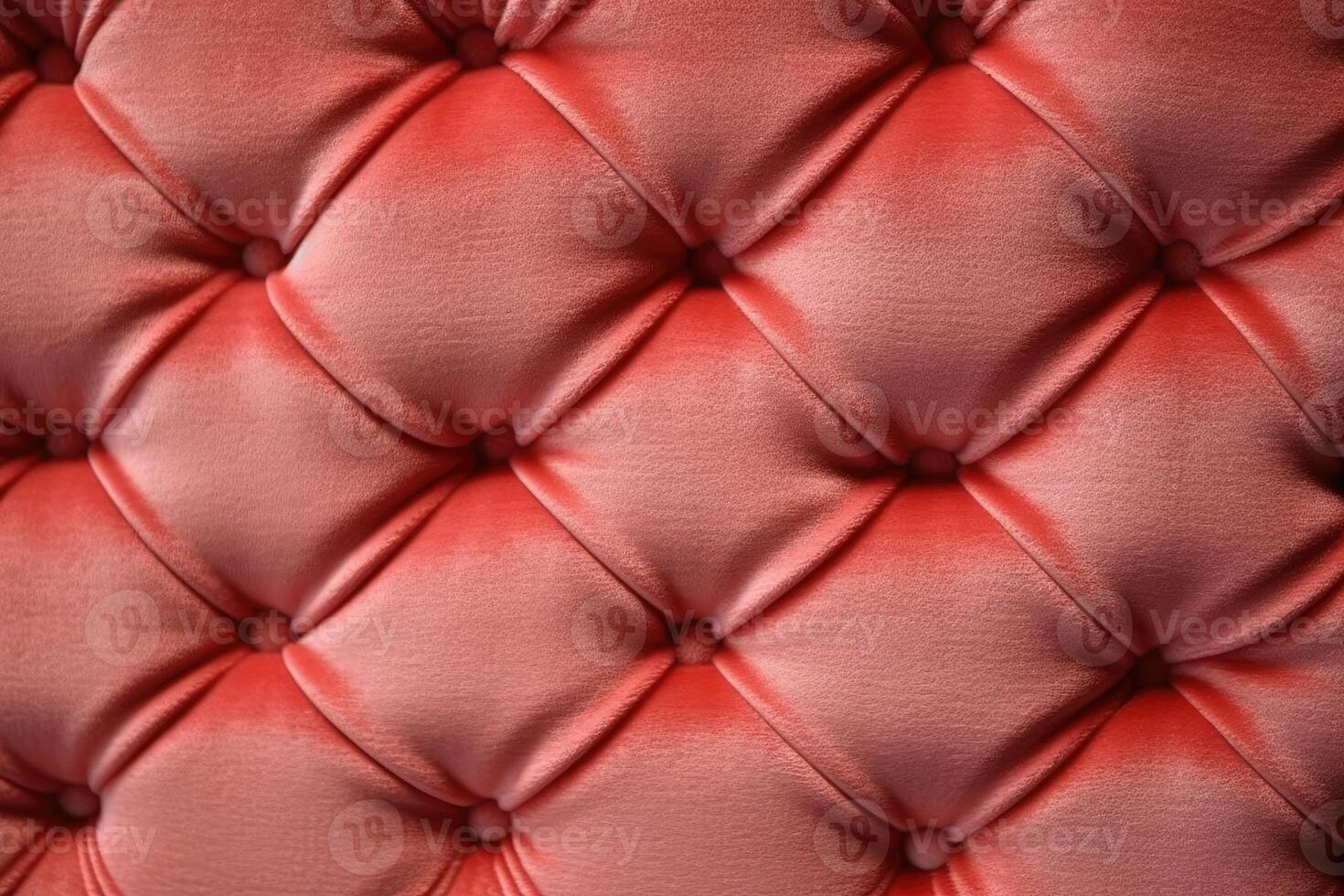 Textured background sofa in coral colours. photo