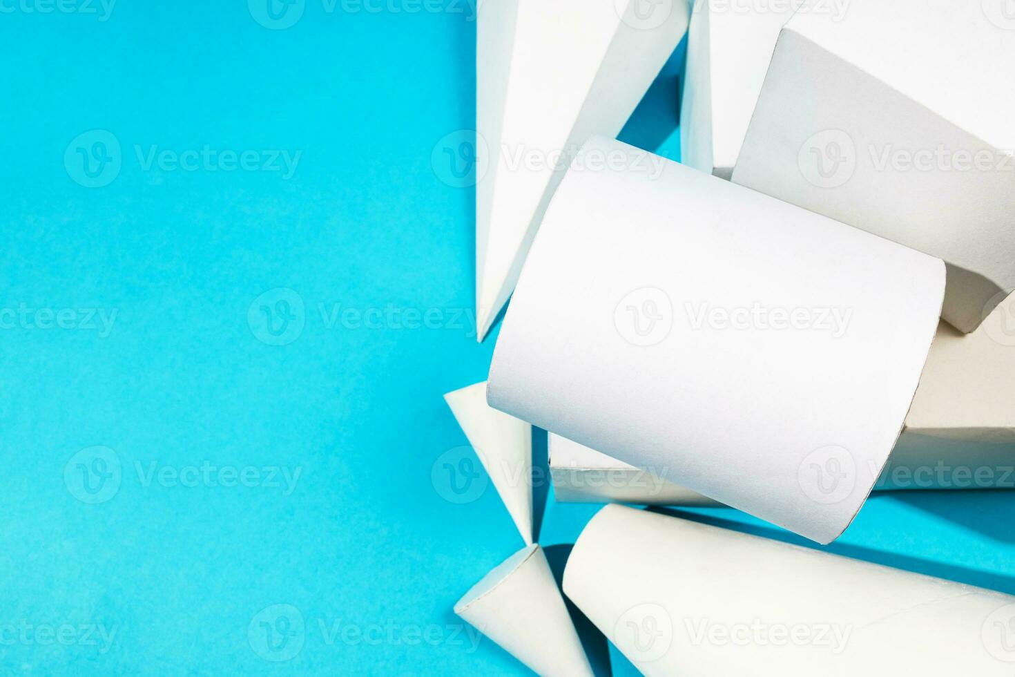 top view of various paper geometric solids closeup photo