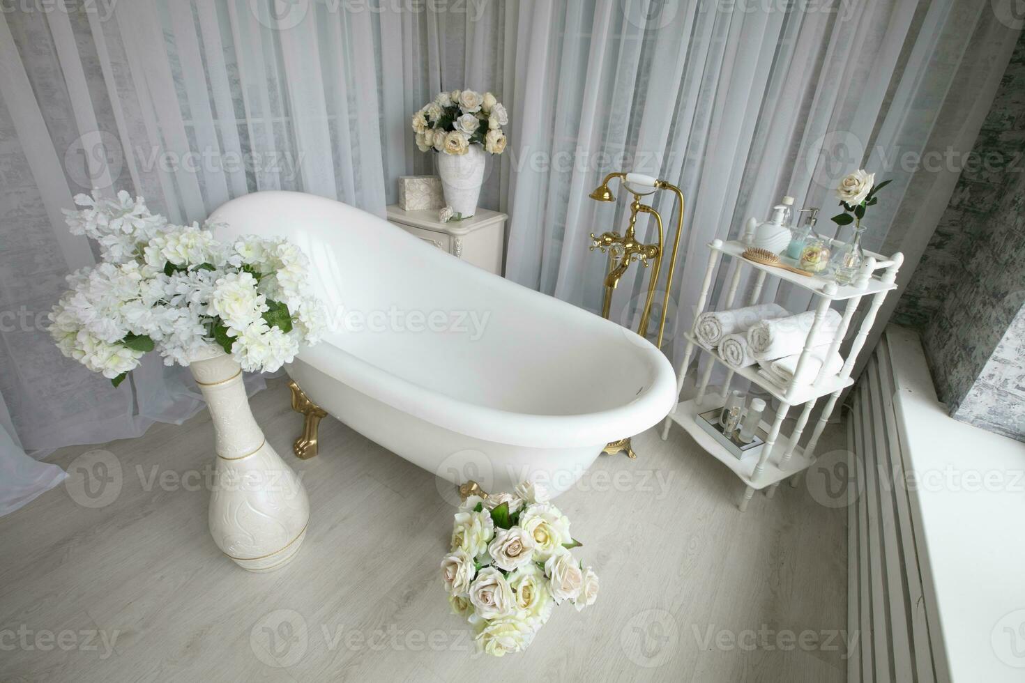 The interior of a beautiful bathroom in a luxurious style. photo