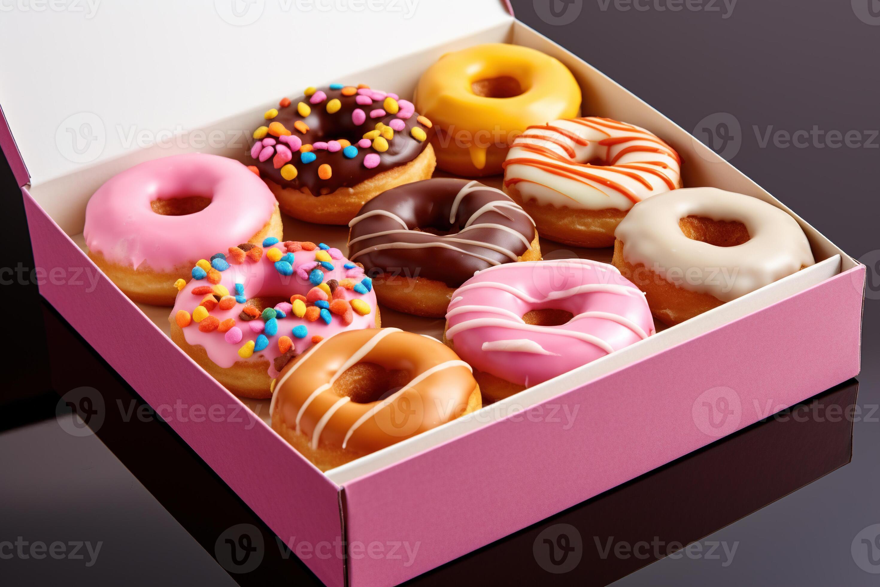 Box of colorful donuts, delicious flavors and eyecatching toppings