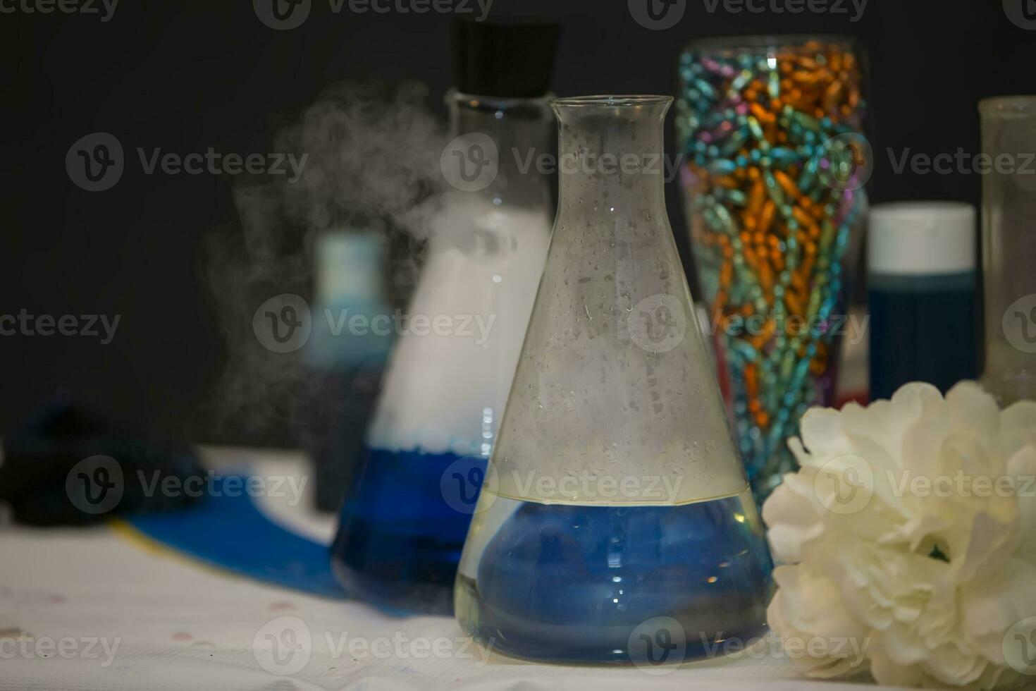 Laboratory flasks with solutions for scientific experiments. photo