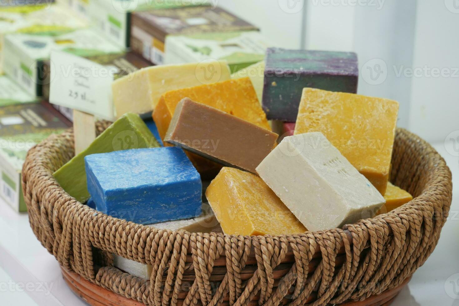 colorful different natural soap bar in a brown wicker photo