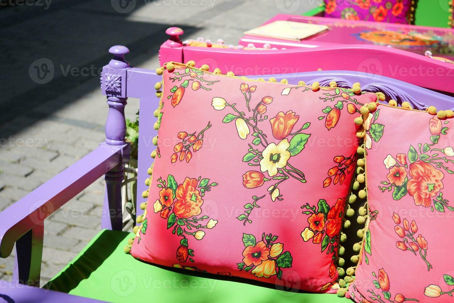 pink color texture pillow on a old sofa on cafe in istanbul photo