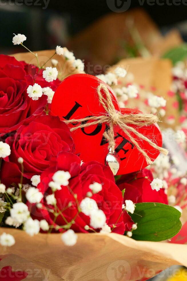 Red Rose Bouquet and heart shape symbol for gift . photo