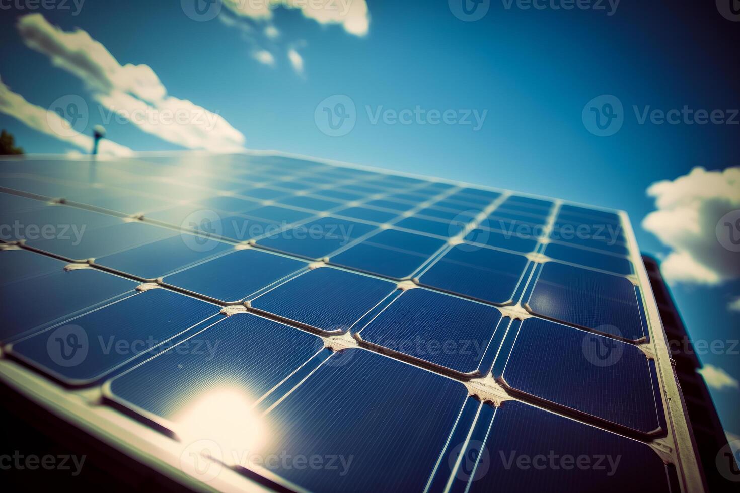 Close up of solar panel with clouds in the background. photo