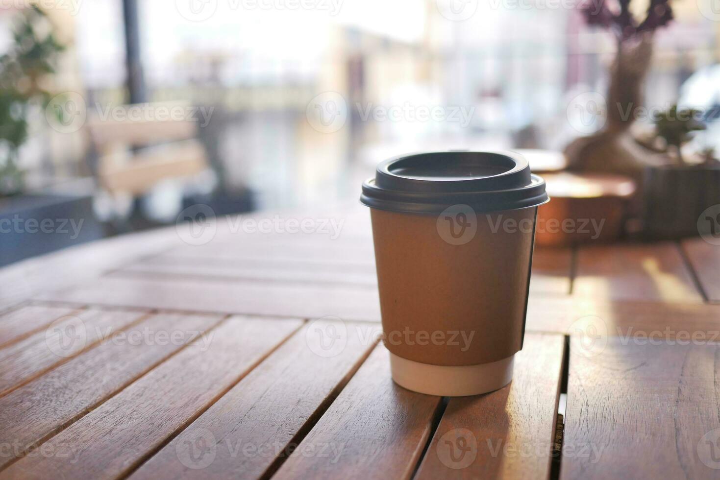 Blank take away kraft coffee cup on table , photo