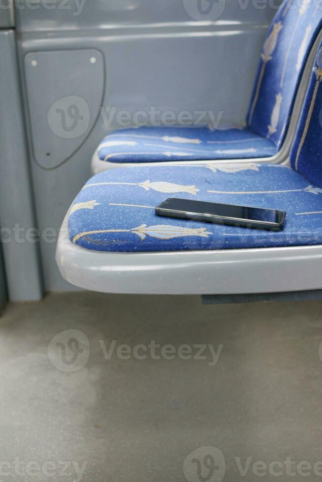 forget smartphone on public bus sit photo