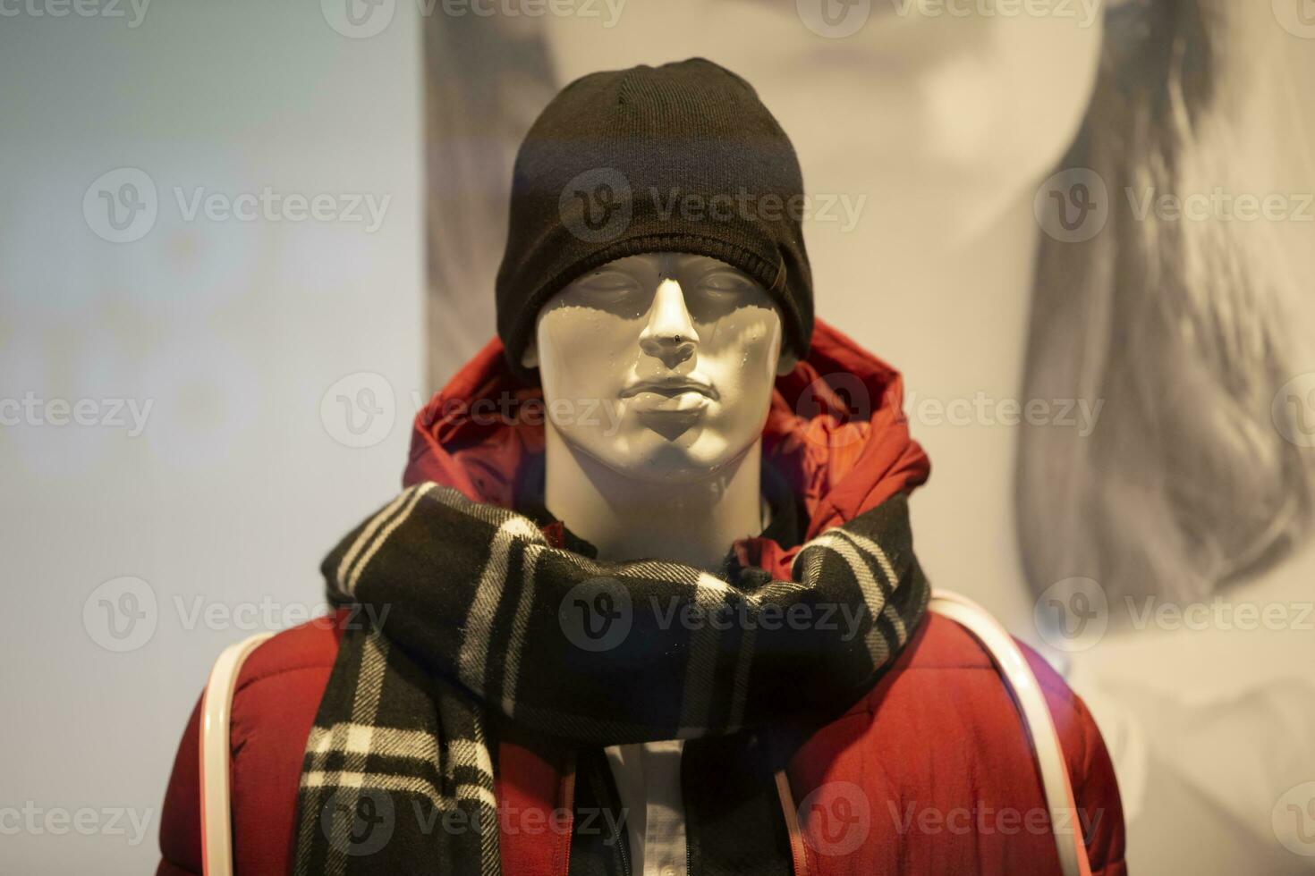 Mannequin man in winter clothes. Clothing sale concept. photo