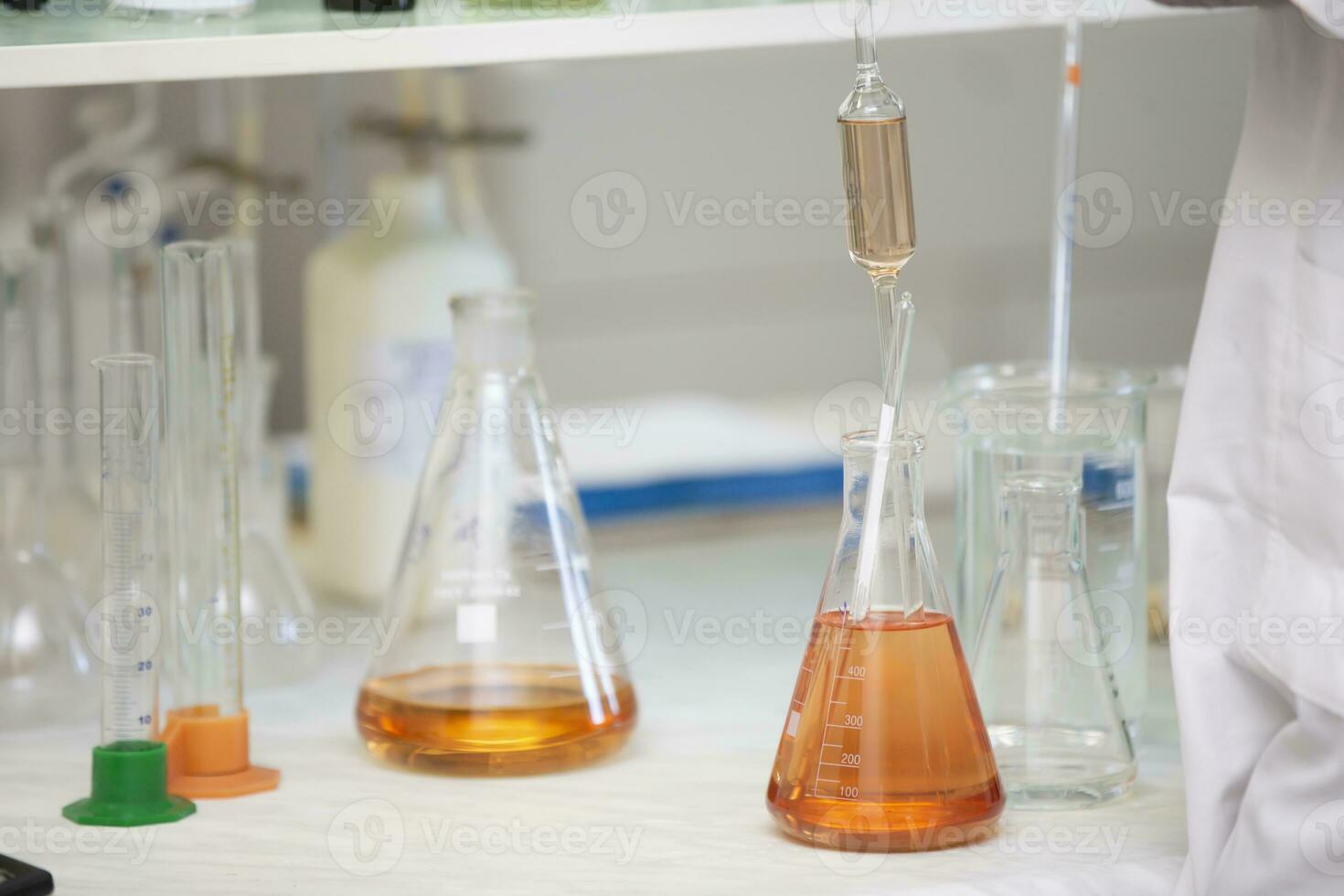 Laboratory with glass test tubes for alcoholic beverages. photo