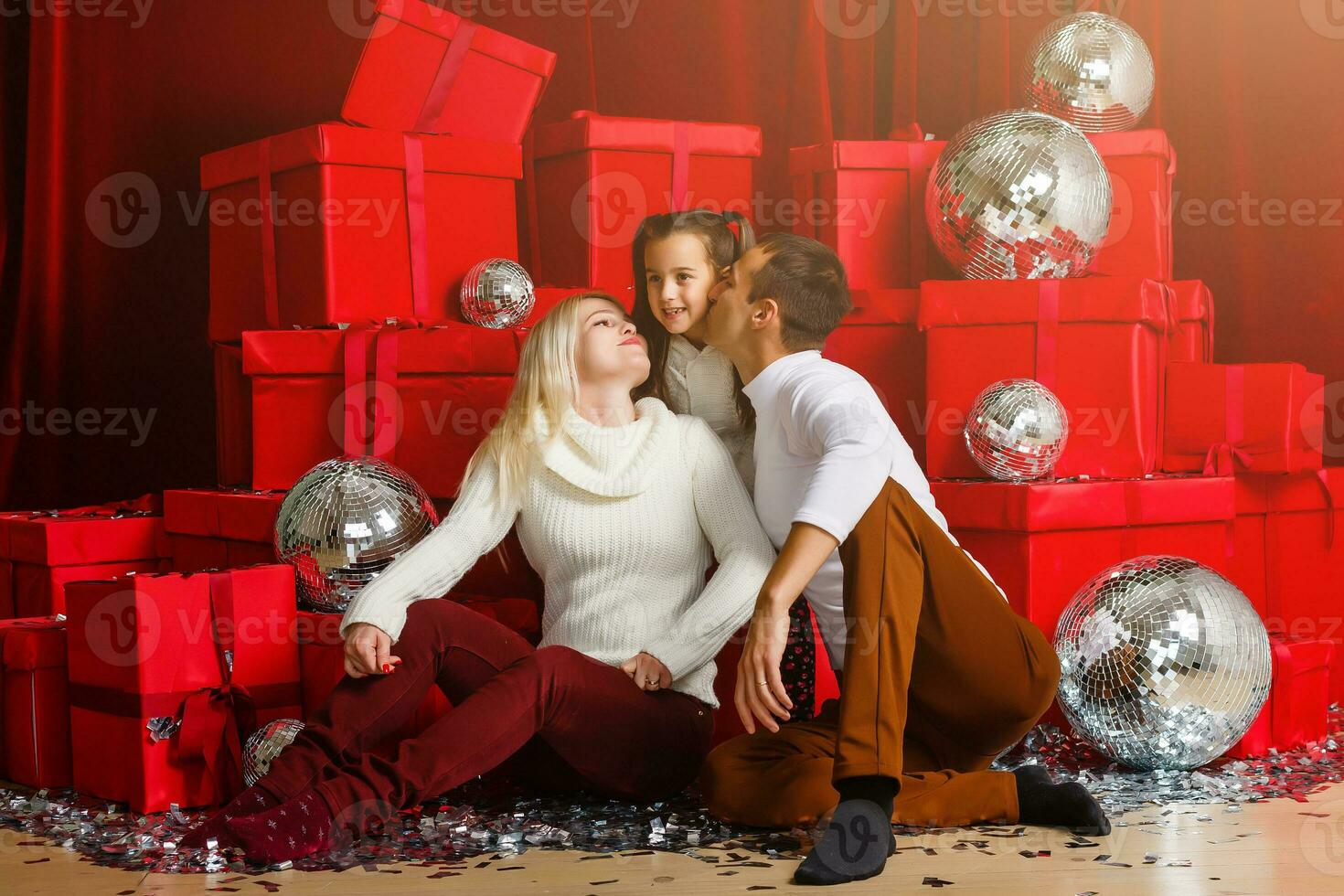 Portrait of friendly family on Christmas evening photo