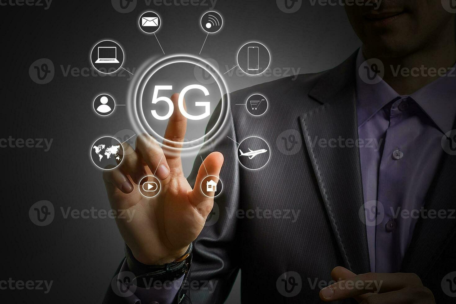 5g internet concept with businessman pressing buttons photo