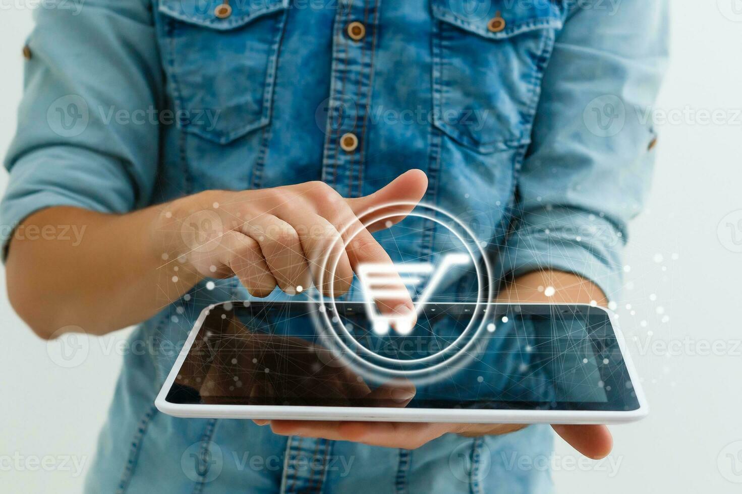 Businessman on blurred background using digital shopping icons with connections photo