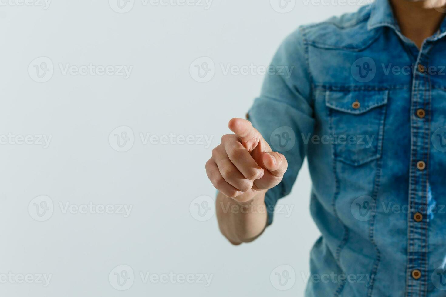 hand presses the index finger on the touchscreen. Button on the touchscreen photo