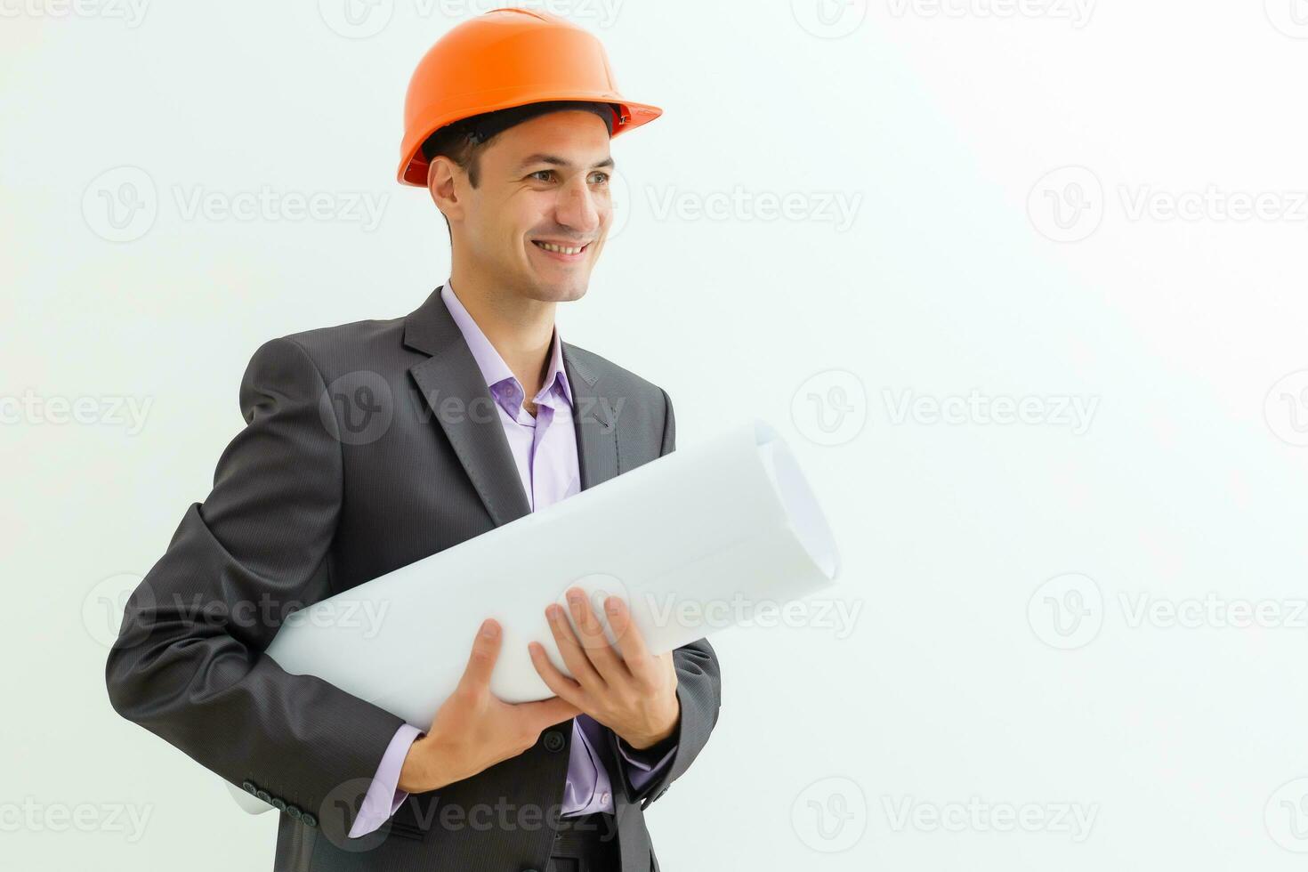 Building worker and architect discussing build drawing on construction site. industrial engineer wearing safety hard hat have meeting commercial building structure photo