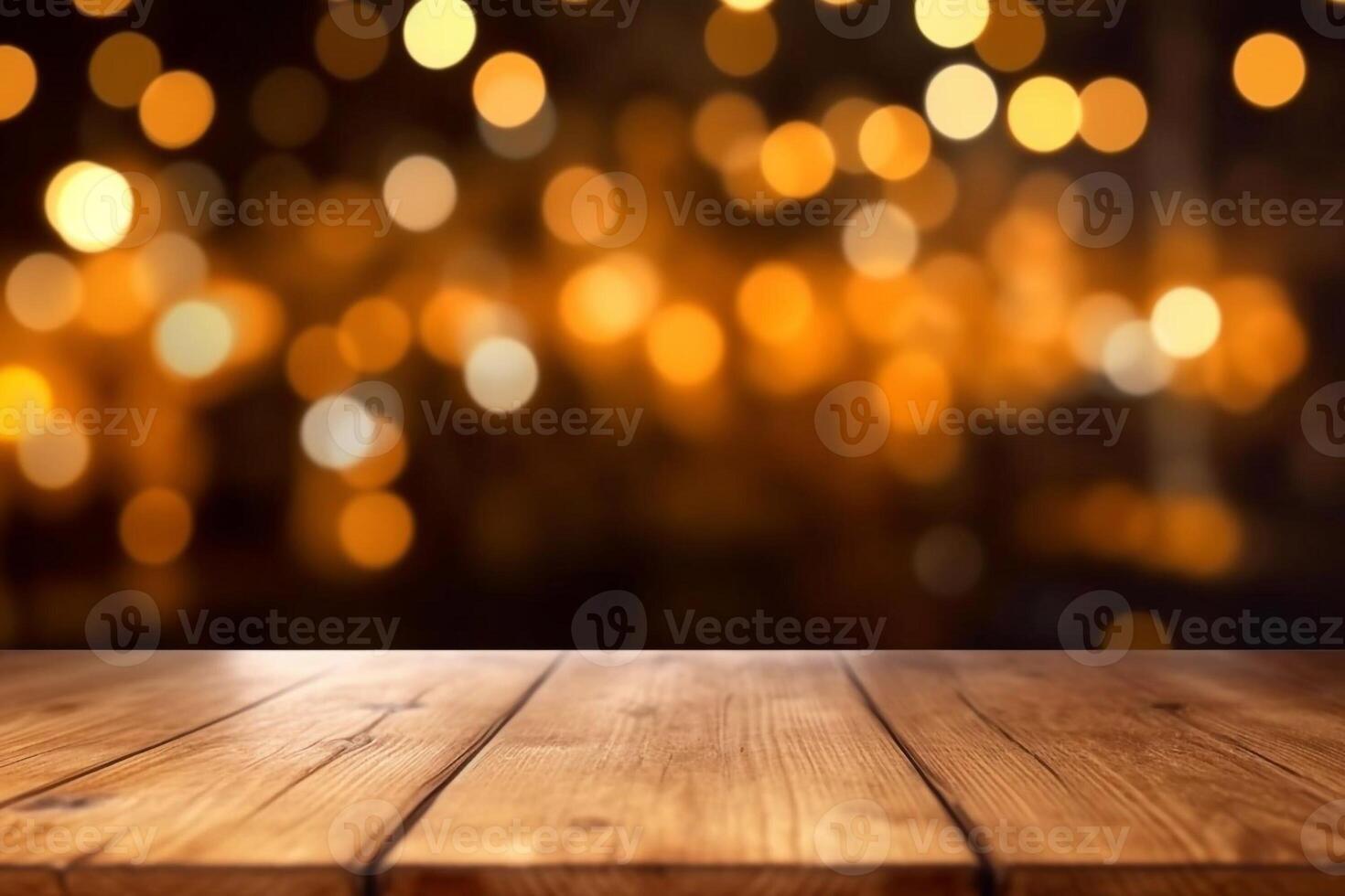 rustic wooden table in front of glitter black and gold bokeh lights photo