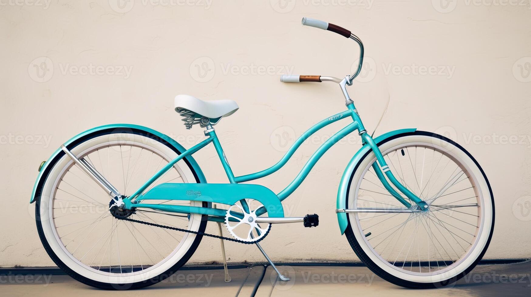 A beach cruiser bike leaning against a wall. photo