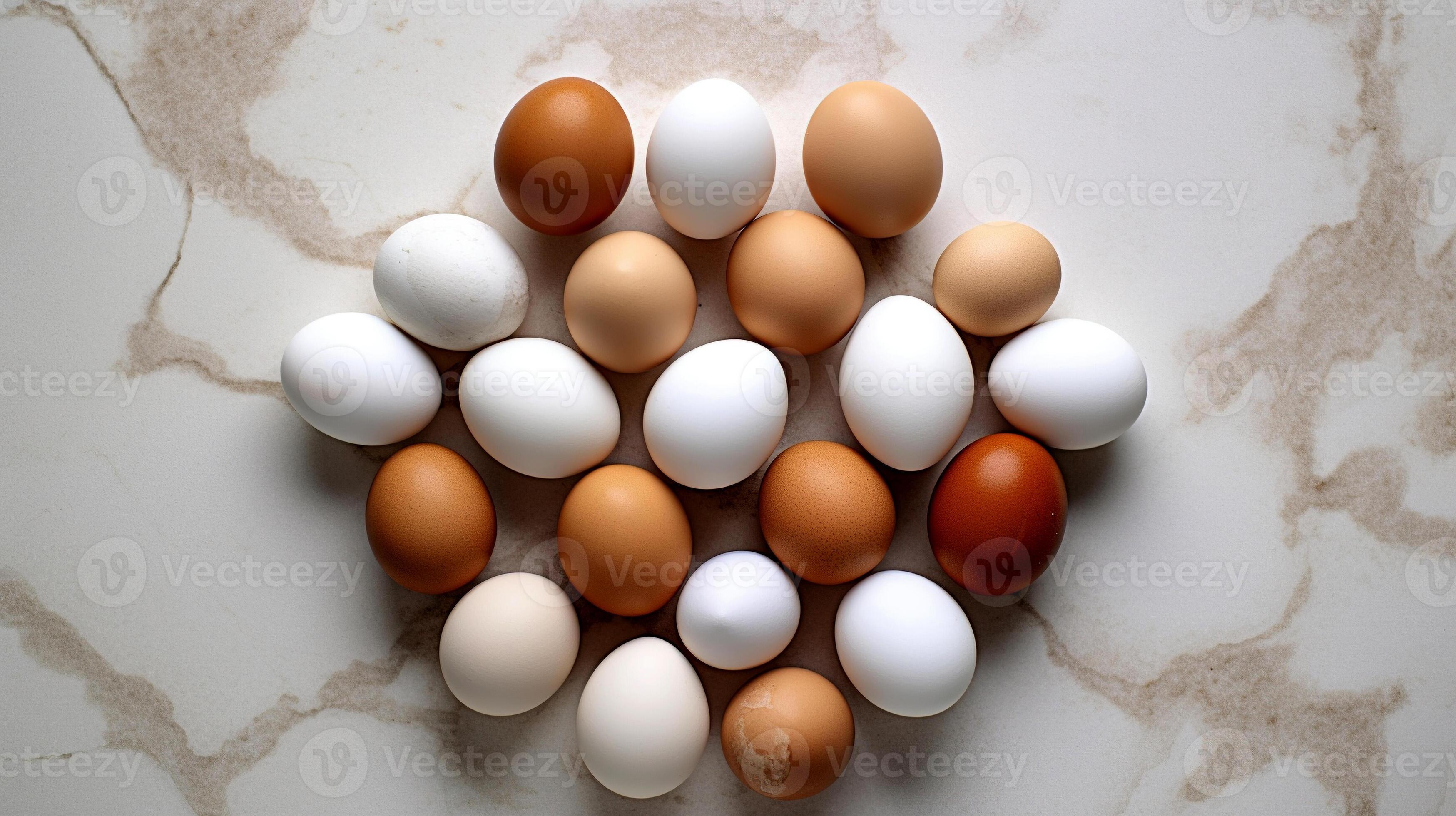 Eggs on white marble floor, view from above. Egg background. White and