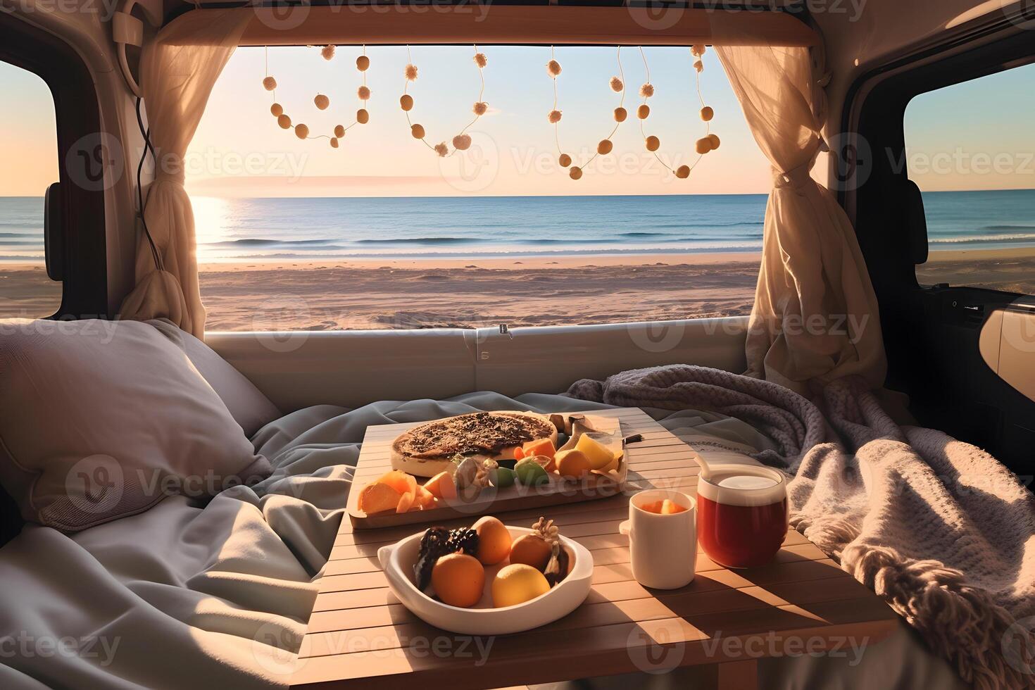 Beach scene seen by camper inside the camper van at sunset. photo