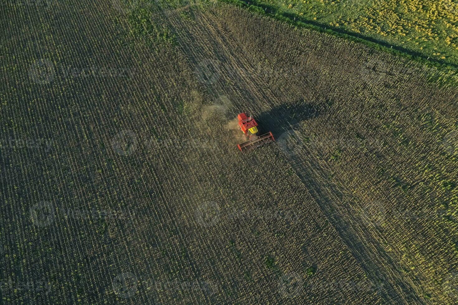 Harvester in Pampas Countryside, aerial view, La Pampa province, Argentina. photo