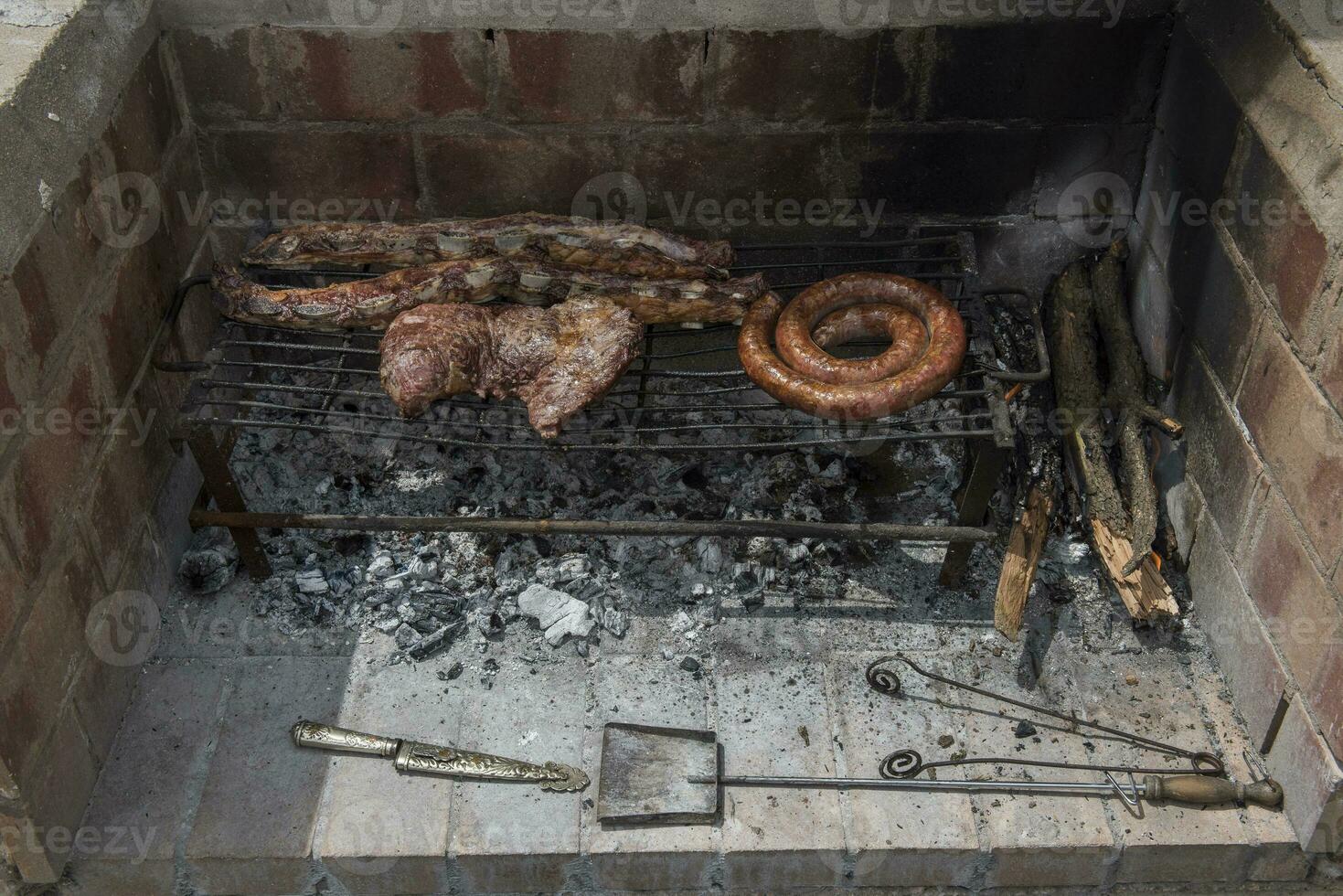 Ribs, roast beef and chorizos photo