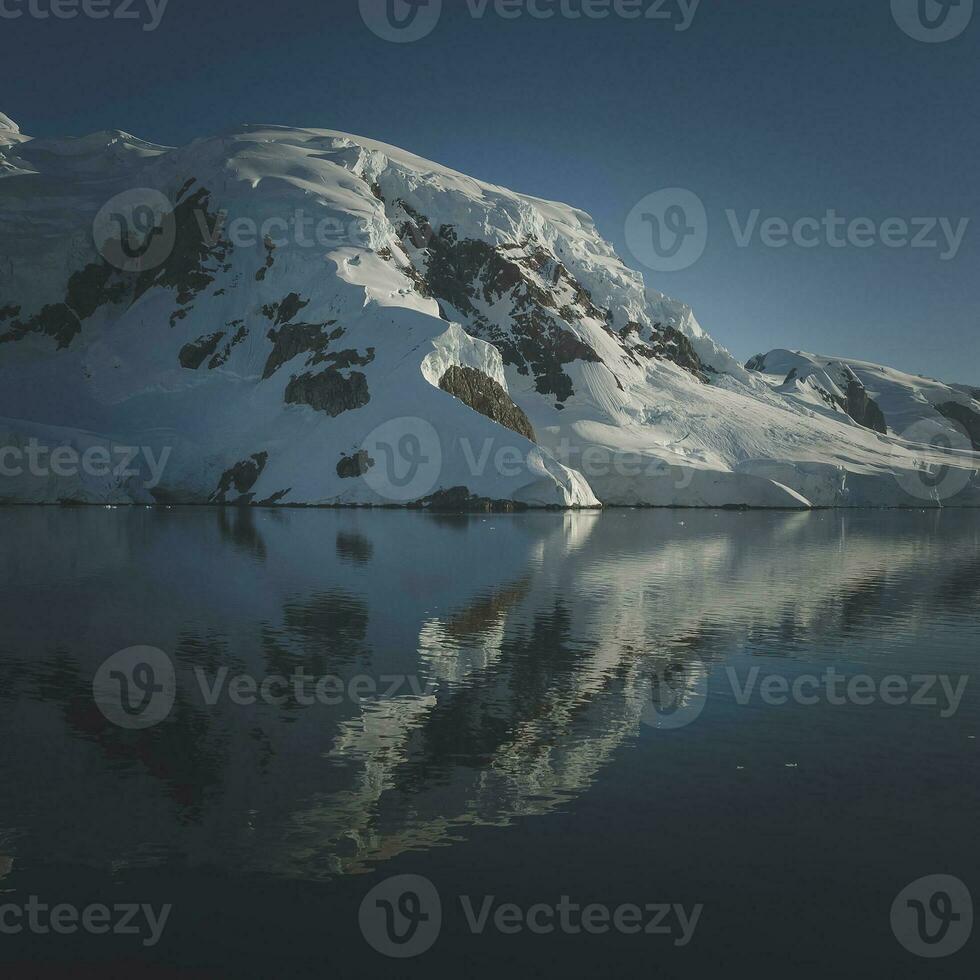 Paradise bay glaciers and mountains, Antartic peninsula, Antartica.. photo