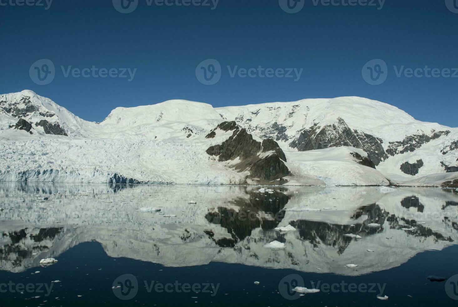 Paraiso Bay mountains landscape, Antartic Pennsula. photo