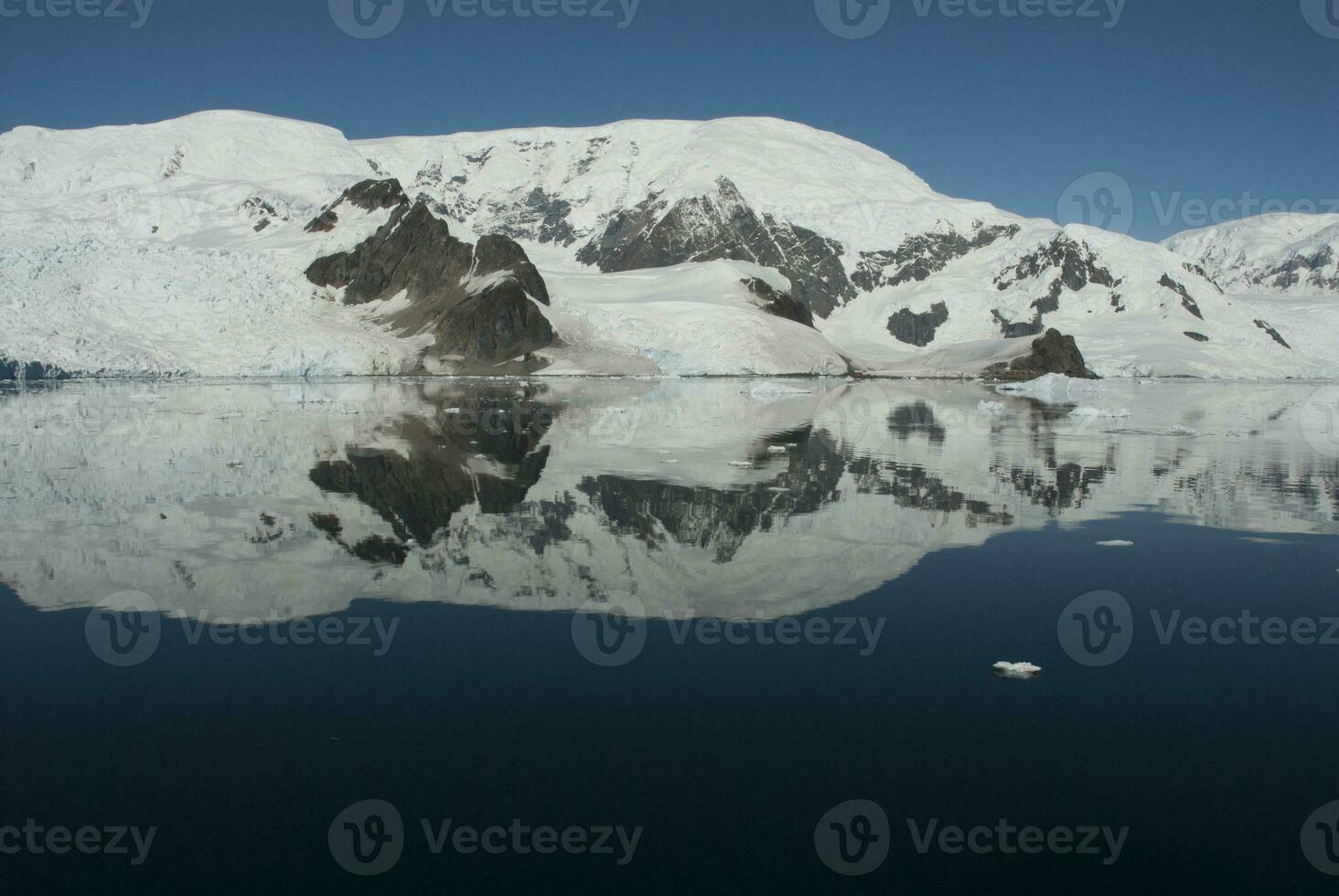 Paraiso Bay mountains landscape, Antartic Pennsula. photo