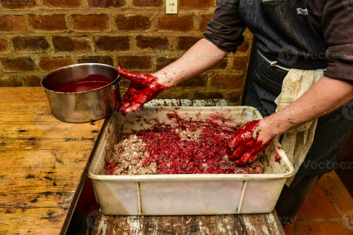hecho a mano sangre salchicha preparación, argentino tradición, pampa, Patagonia foto