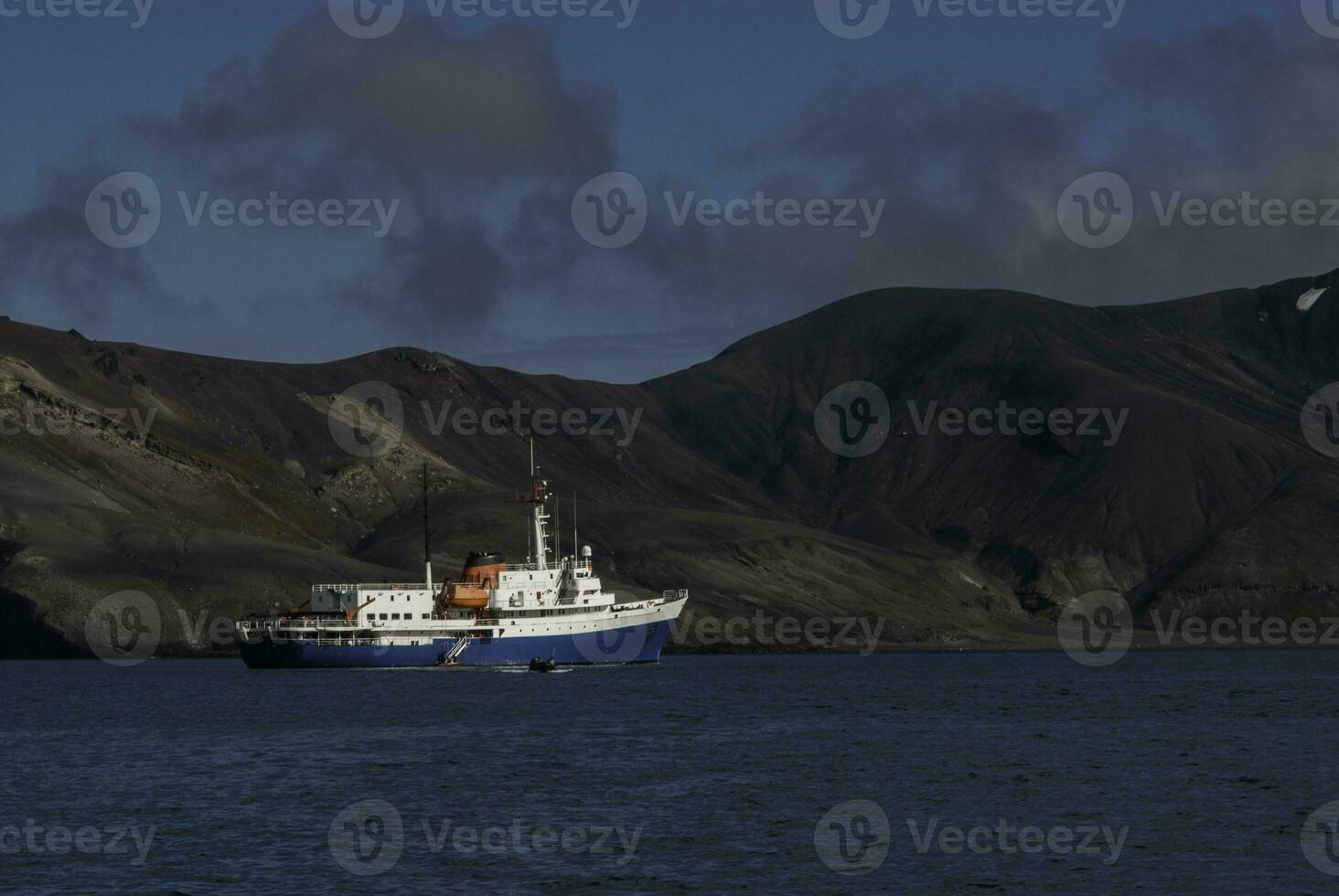 Expedition cruise in  Deception Island, Antarctic mountainous landscape, Antarctic Peninsula photo