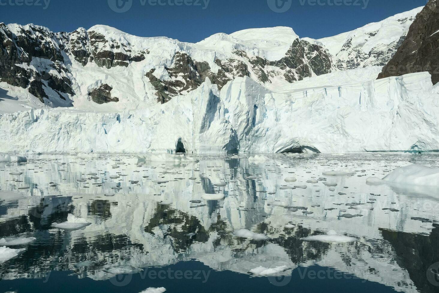 Paradise bay glaciers and mountains, Antartic peninsula, Antartica.. photo