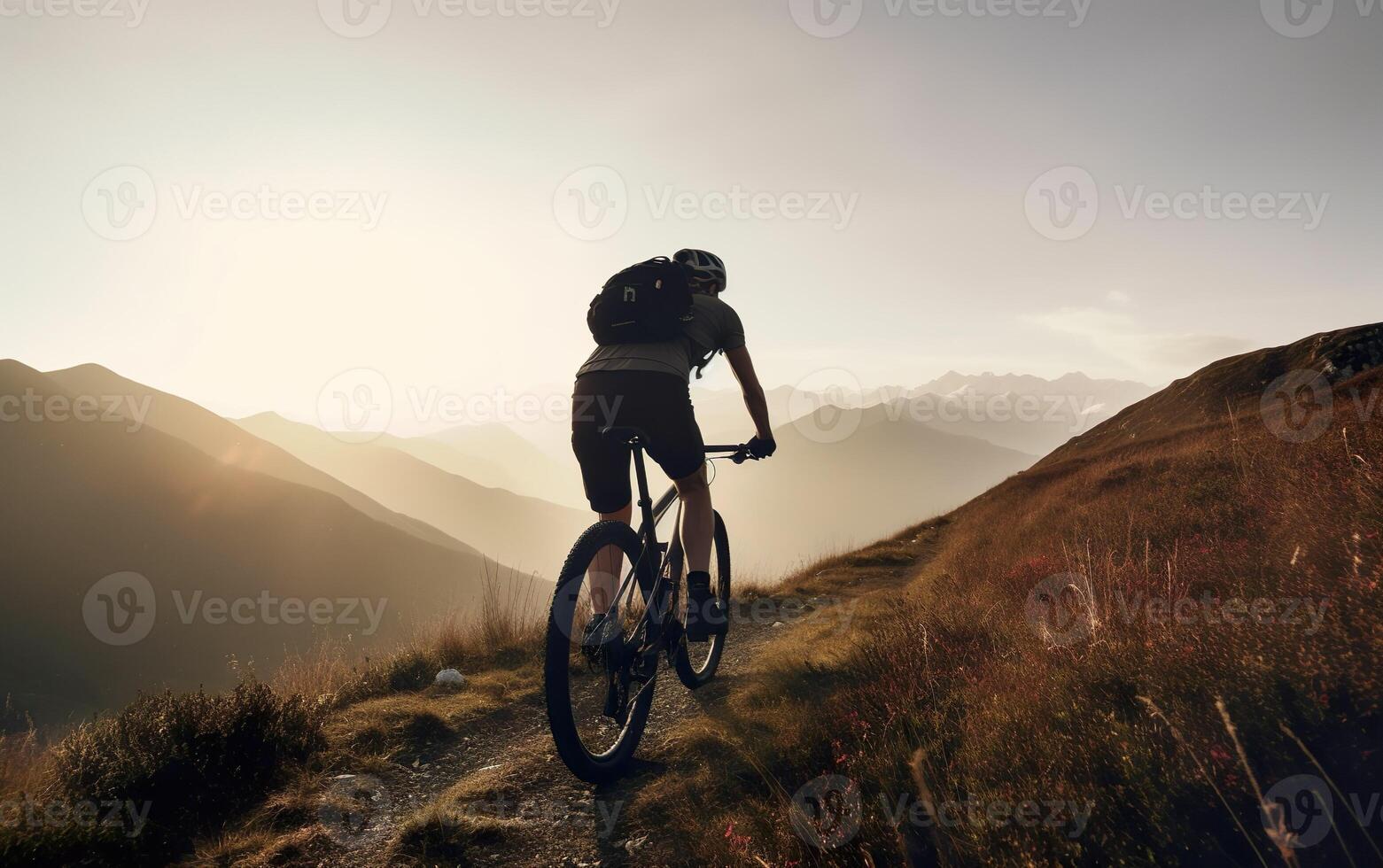 Mountain biking cyclist on a mountain trail at dawn. AI, Generative AI photo