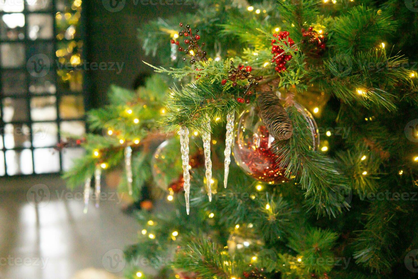 Vintage handmade Christmas tree toy hanging on a Christmas tree, close-up photo