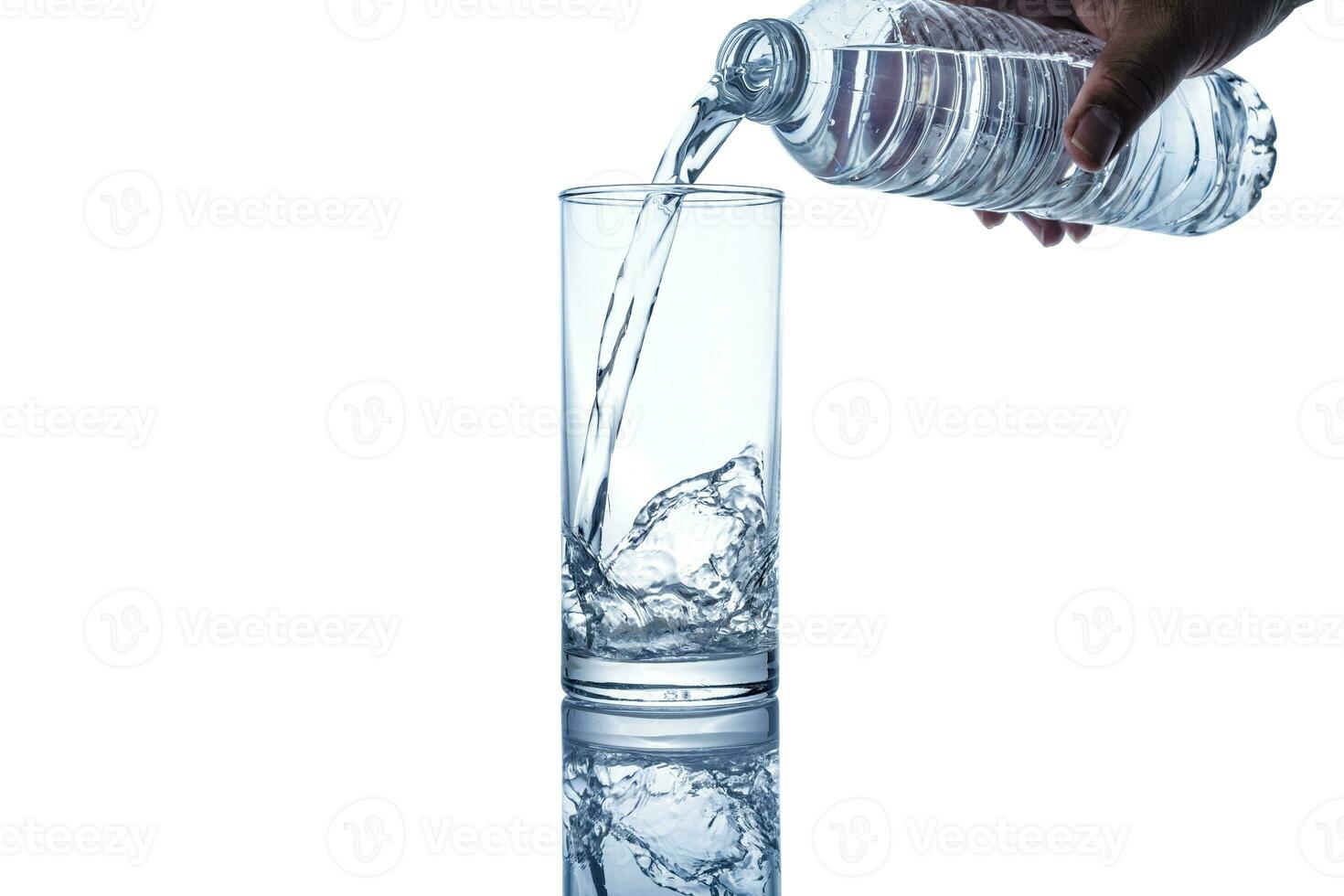 real image, spilled water drop on the floor isolated on white background photo