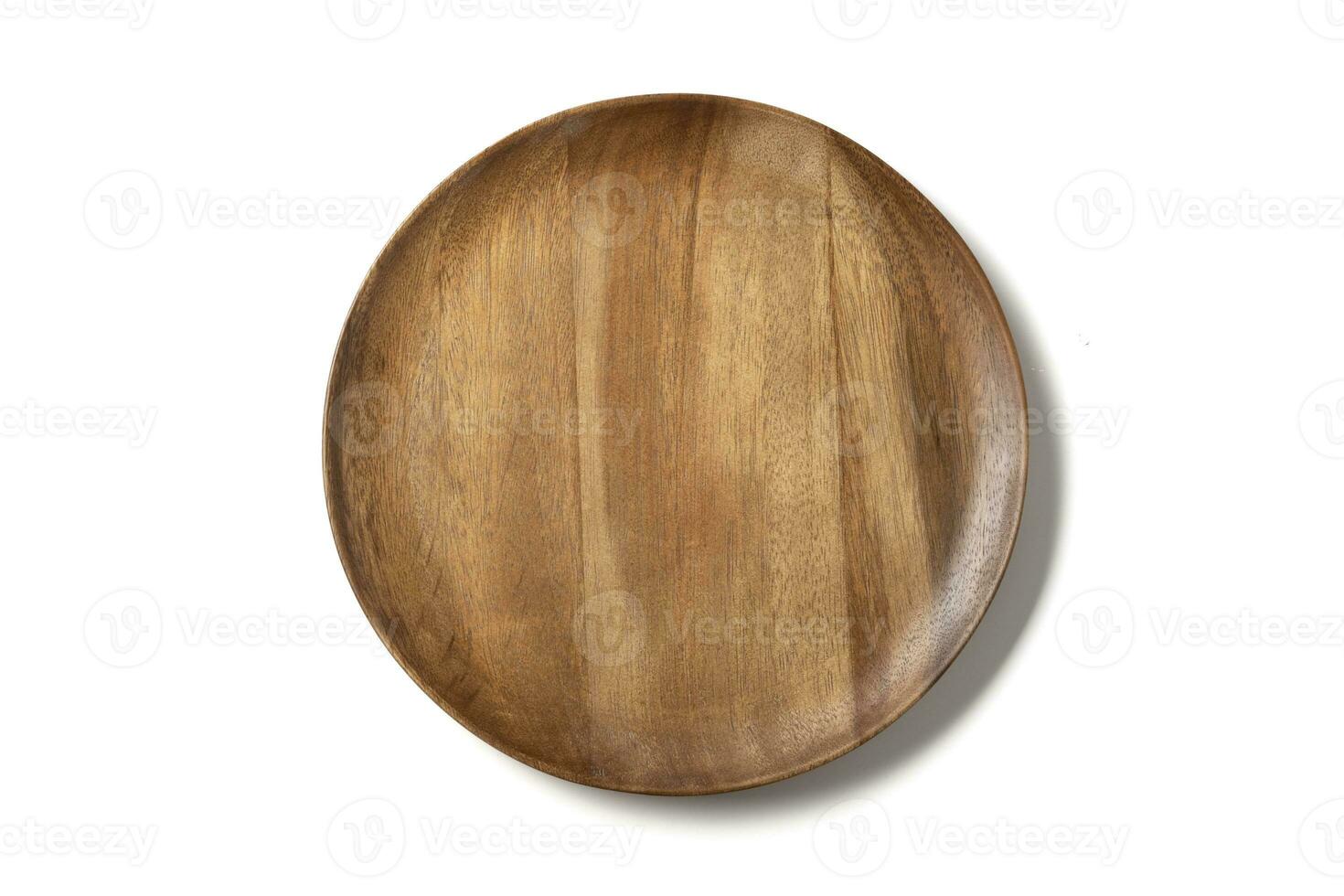 Top view,Antique wooden plate With beautiful patterns, plate food or coffee isolated on white background. photo