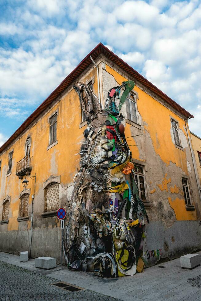 The streets of Vila Nova de Gaia with the Half Rabbit street art. Gaia, Portugal. June 11 2023 photo
