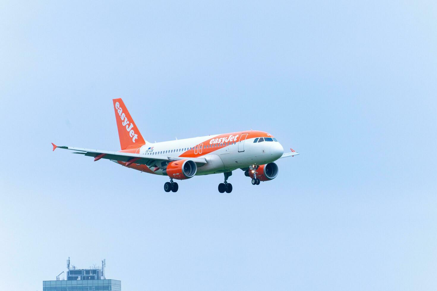 Airplane from EasyJet landing at Schiphol AirPort. Amsterdam Netherlands April 15 2023. photo