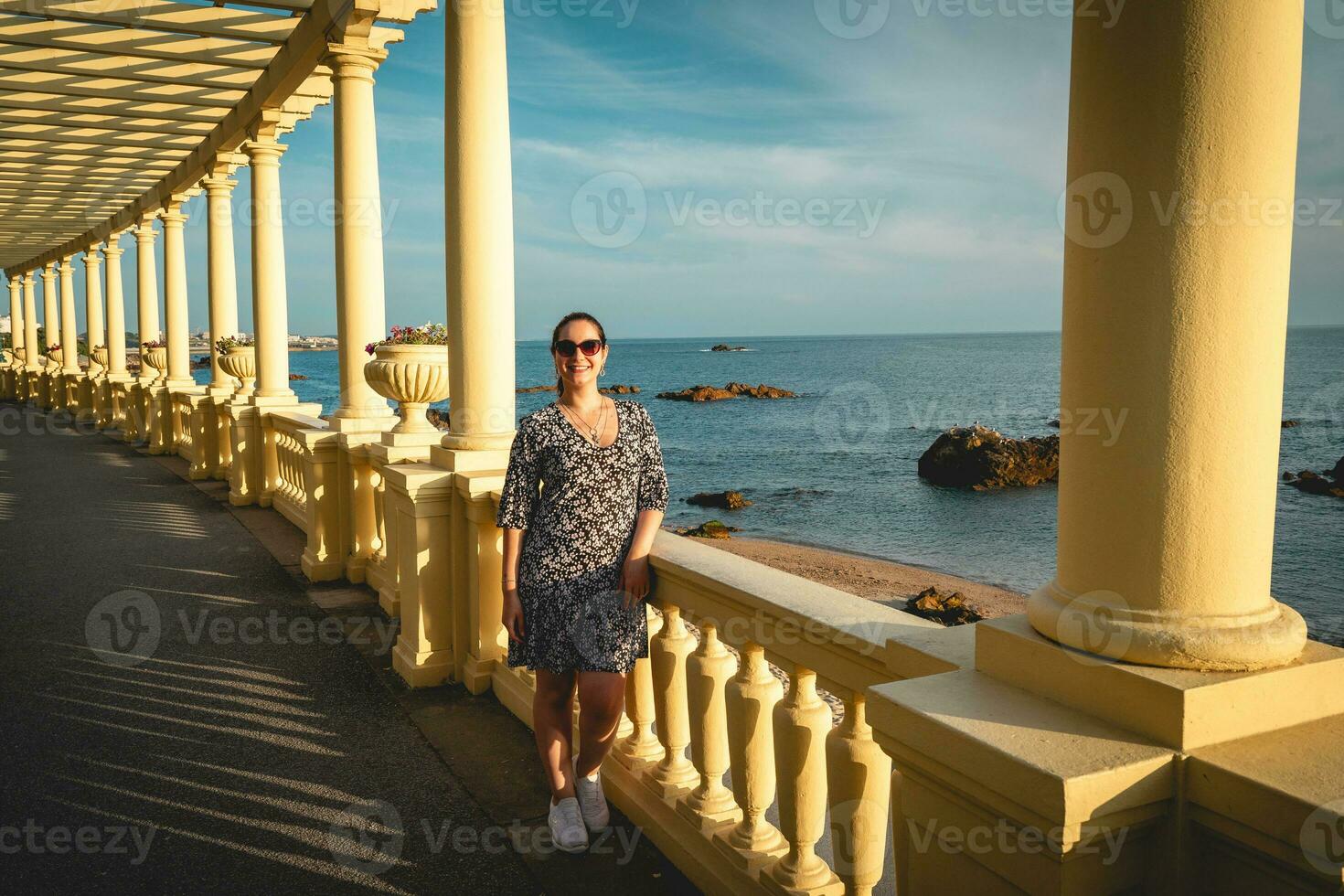 Woman posing on the boulevard in Porto , Portugal. photo