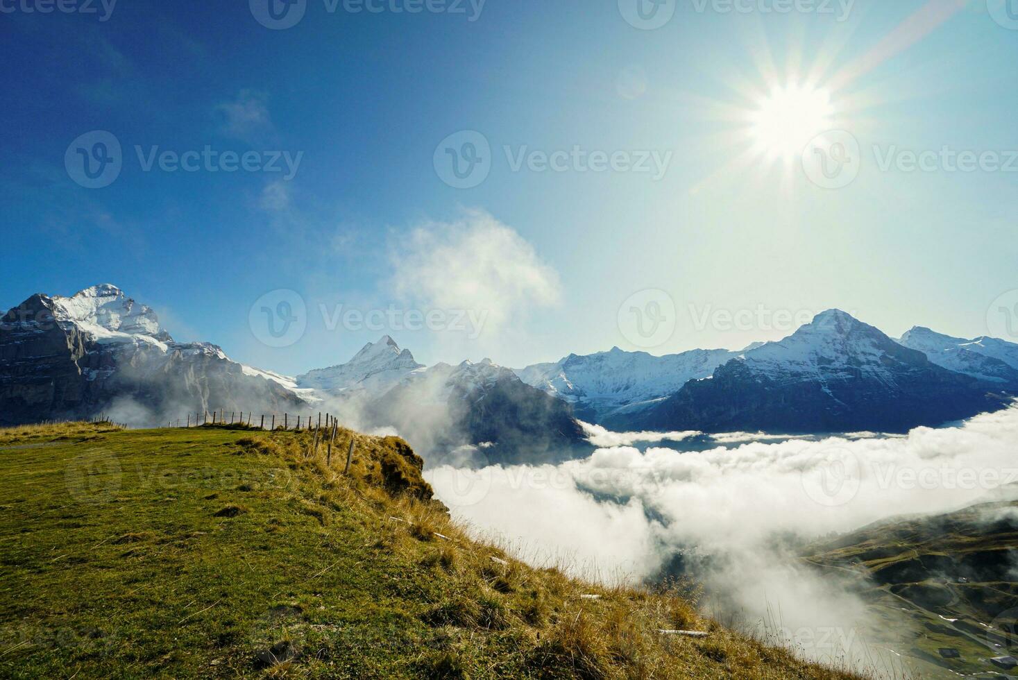 Beautiful view of nature trail in the morning, Grindelwald First, Highest peaks Eiger, Switzerland Alps. For trekking, hiking, mountaineering or nature walk activities. photo