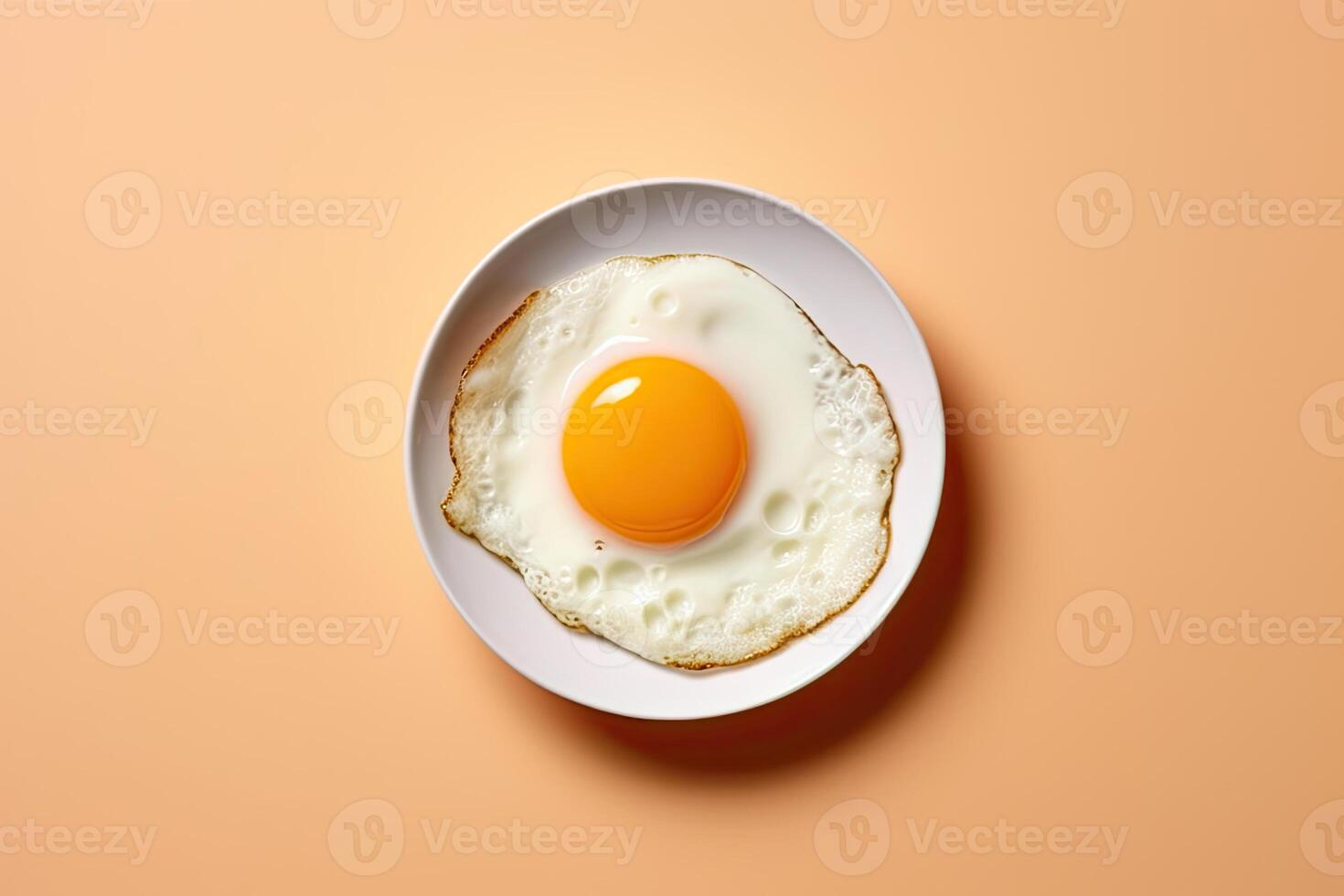 fried egg on a white plate, flat lay. photo